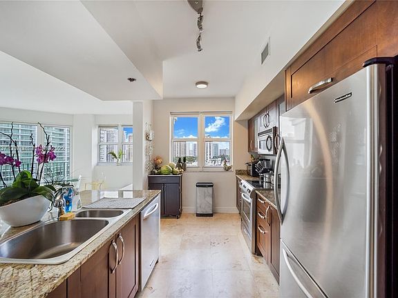 5th image of 20000 Country Club Dr APT 1211