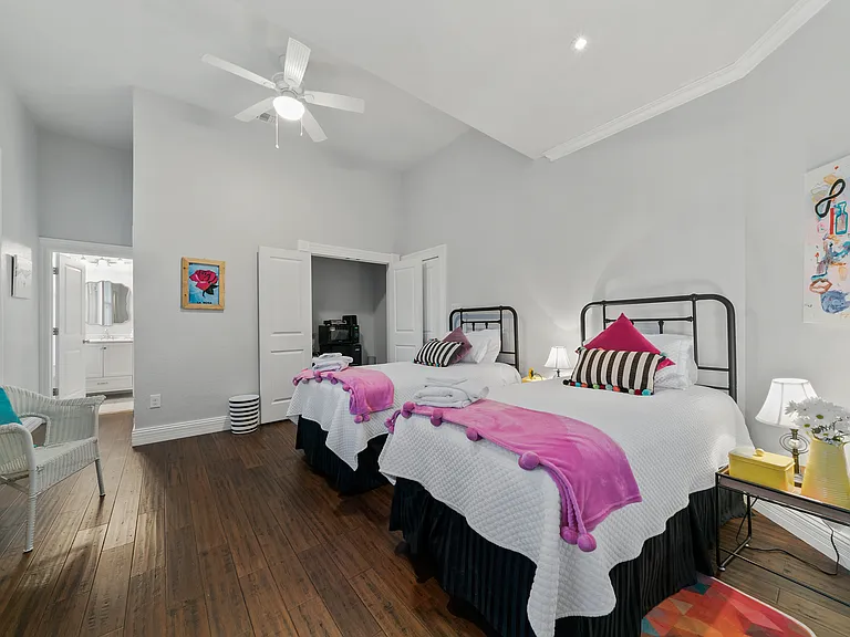 Bedroom #4 has ample room for 2 twins or a king bed. It can be opened to the main house if desired. (Side B)