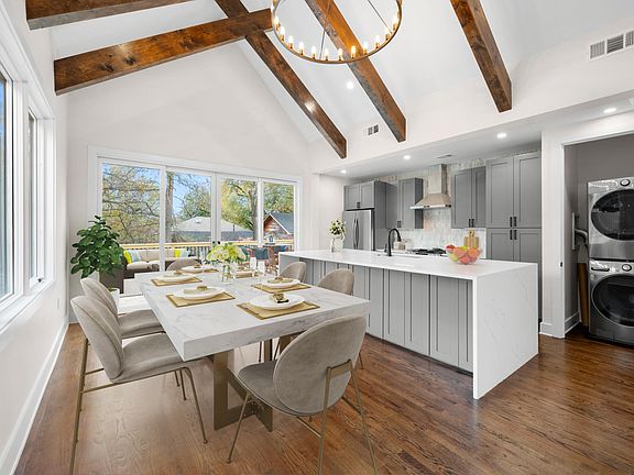 Open floor space, vaulted ceilings and electric fire