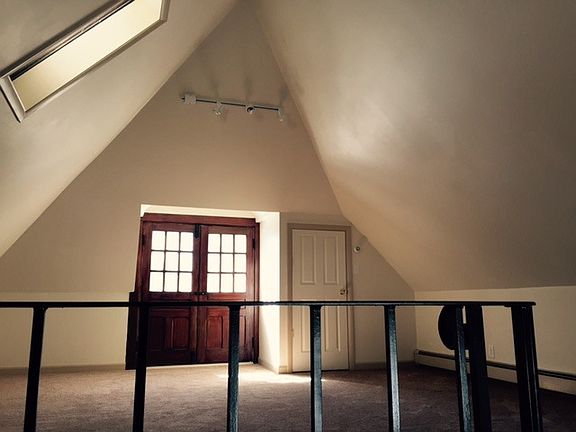 Large bedroom with skylight