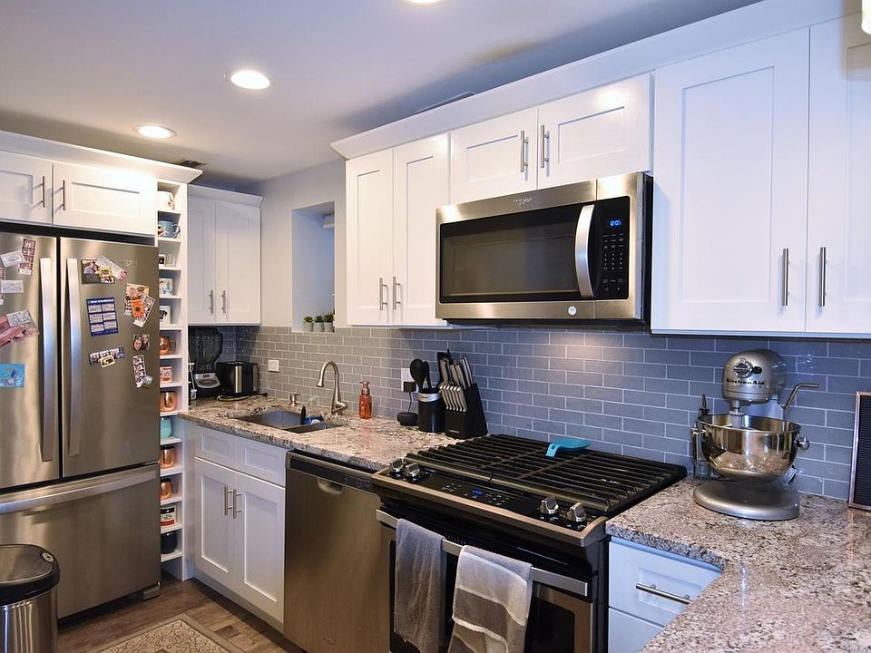 Updated, stainless steel appliances and dishwasher. Built-in microwave