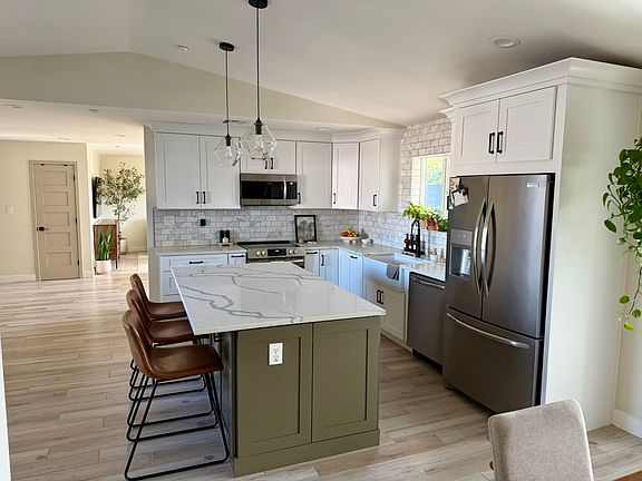 5th image of 6407 E Lewis Ave
