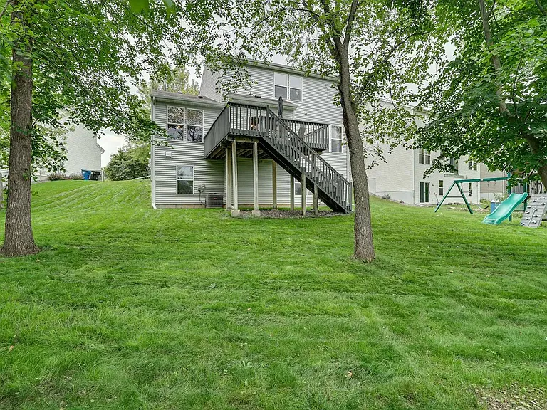 Backyard and side yard partially fenced