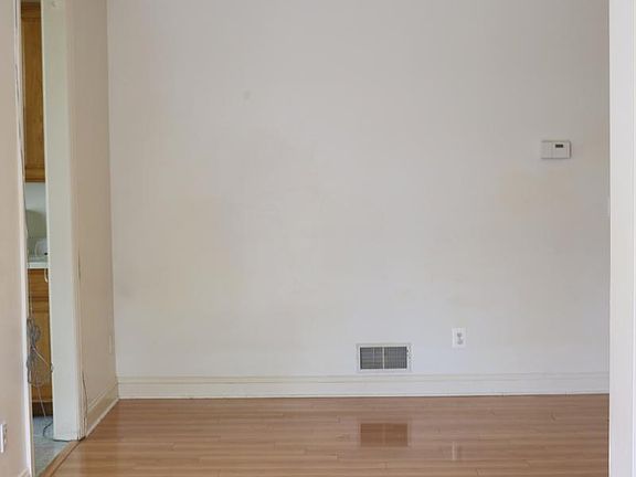 Located just outside of the kitchen.
