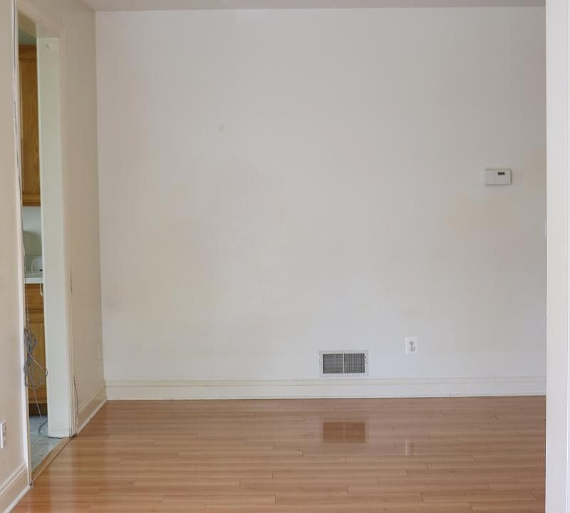 Located just outside of the kitchen.