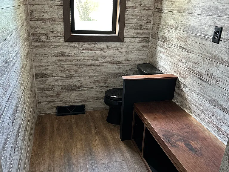 1/4 bath/mud room just off the entry to the house from the attached garage.