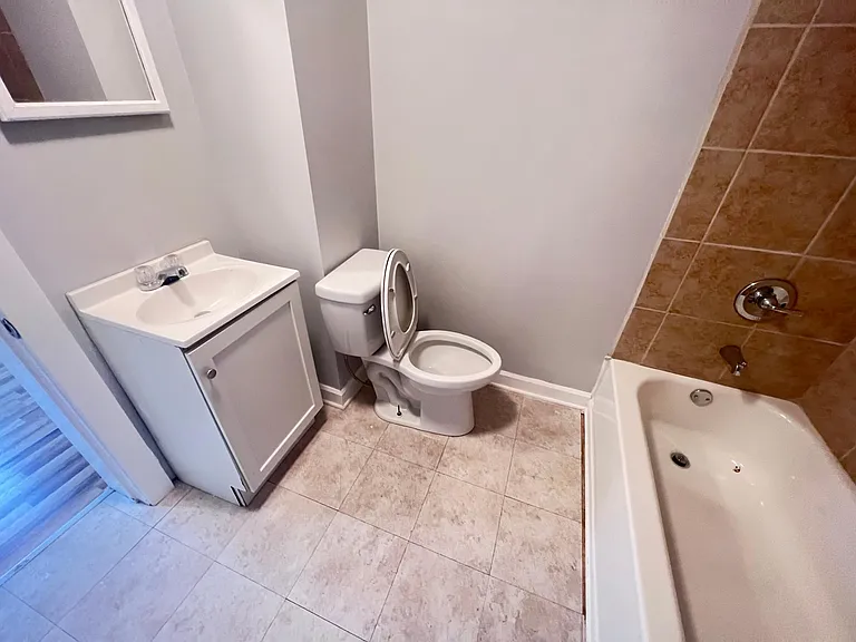 Full Bathroom With Built In Storage