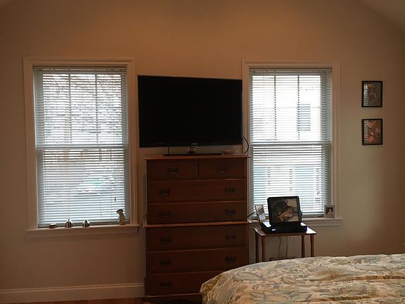 High cathedral ceilings in master bedroom with wonderful closet space.