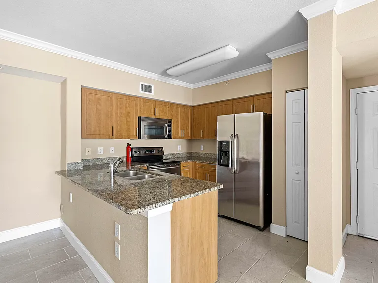 6450 Emerald Dunes Dr #103 — Photo 9