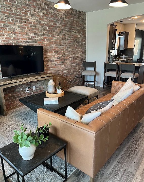 living room fully furnished with everything shown