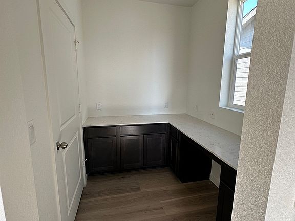 Tech Space on main floor and left large pantry
