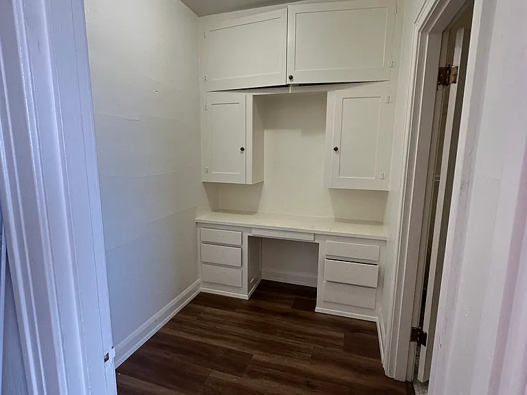 The space doubles as as a bureau for your make up or as a small office.