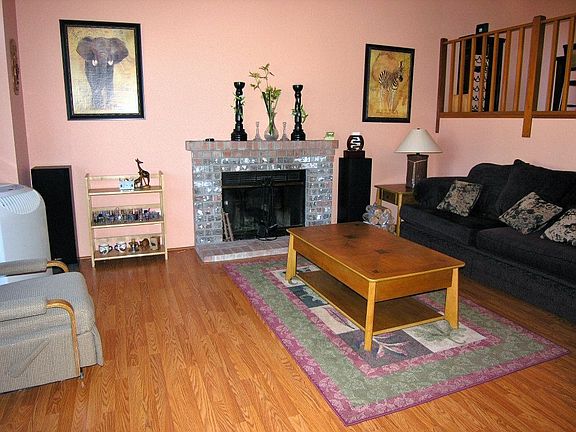 New laminate, ceiling fan, fireplace