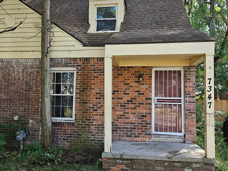 7347 Curtis St — Photo 1