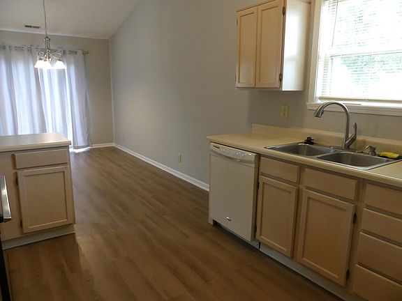 Eat in dining area large enough for larger tables & chairs.