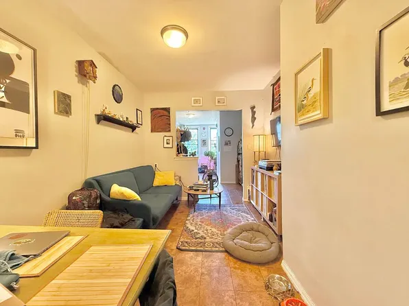 64-11 Myrtle Avenue image 1 of 12