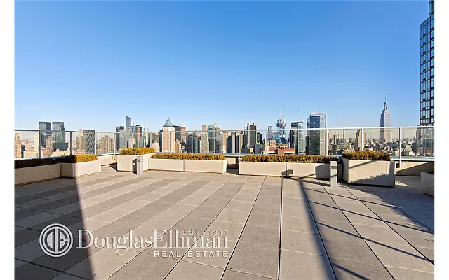Sold by Douglas Elliman | media 12