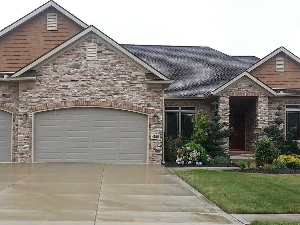 Front~Note: Lifetime Rustic Dimensional shingles, oversized commercial gutters