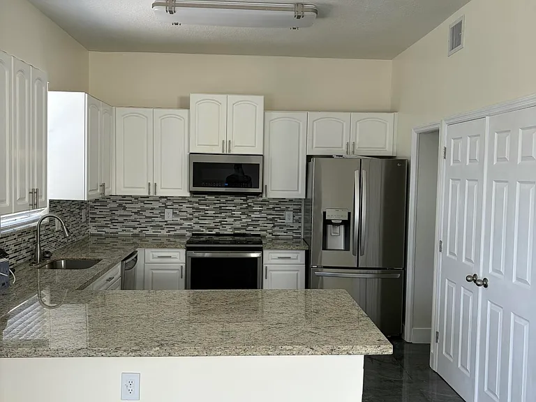 9860 NW 20th Ct — Photo 3