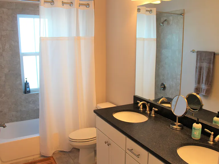 Private master bathroom with double sinks