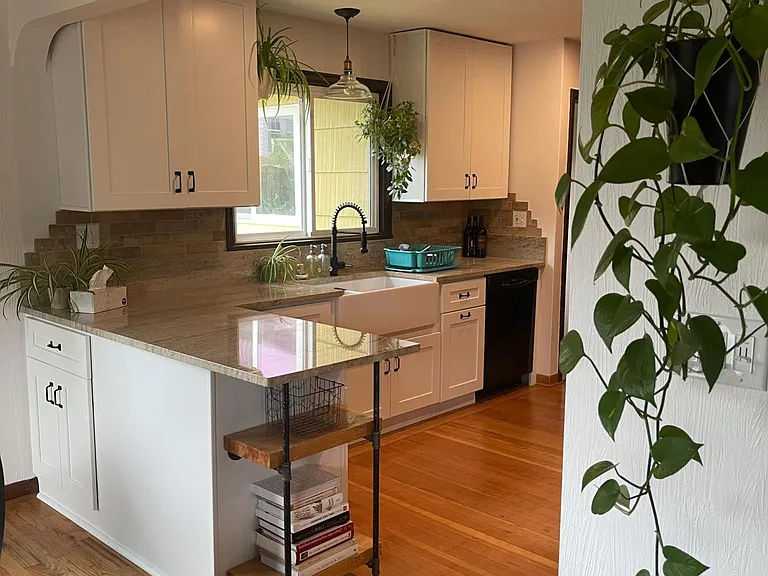 Granite countertops, GFCI outlets, soft-close cabinet doors.