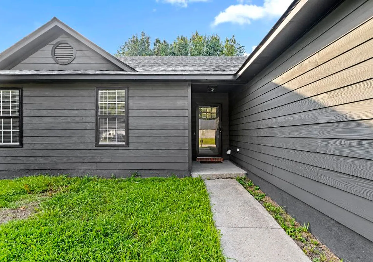Stylish Home with Open Floorplan & Fenced Backyard — Photo 2