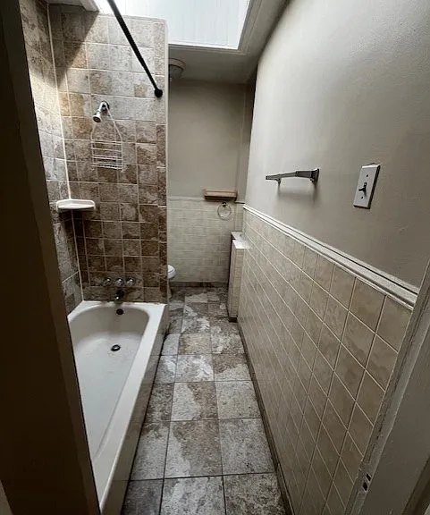 1st bathroom as you enter the apartment