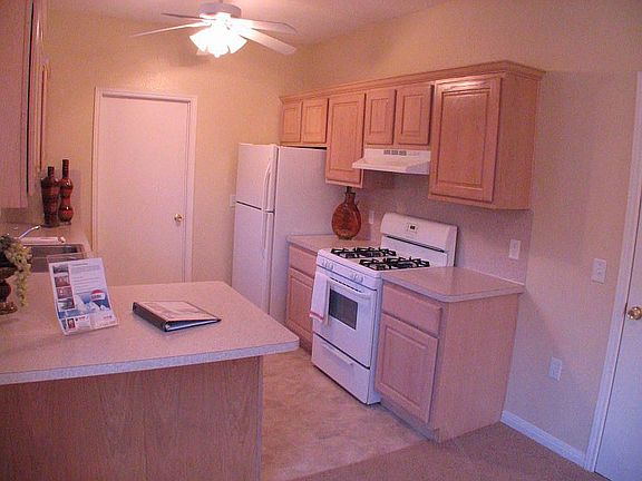 Kitchen includes fridge