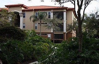 Front of Building - Condo has Courtyard View