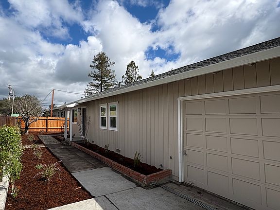 driveway to garage and path to front door