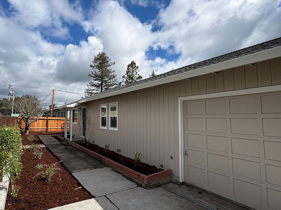 driveway to garage and path to front door