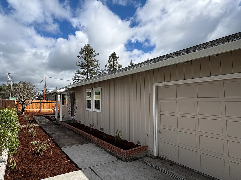 driveway to garage and path to front door