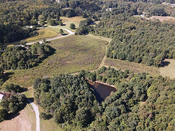 Small pond in rear corner