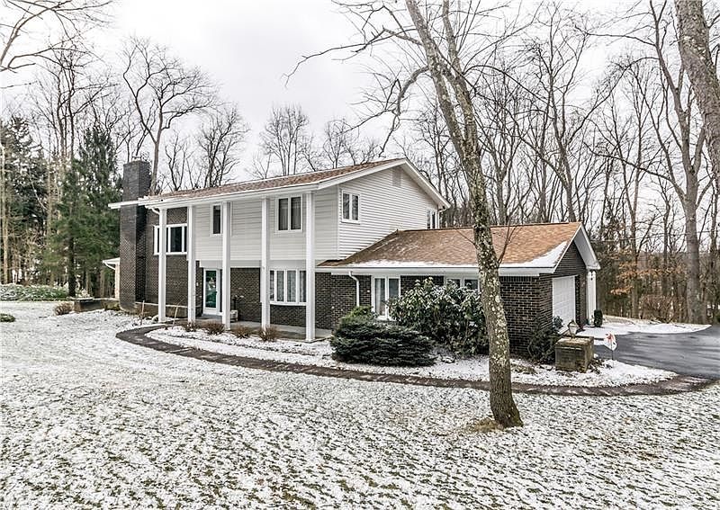 Welcome to 125 Sunset Drive in North Strabane Township, located on more than three private and secluded acres!