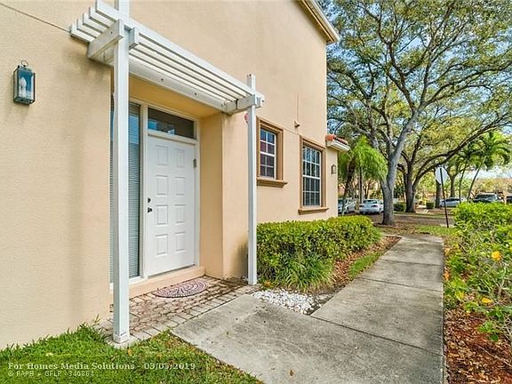 2nd image of 9820 Royal Palm Blvd
