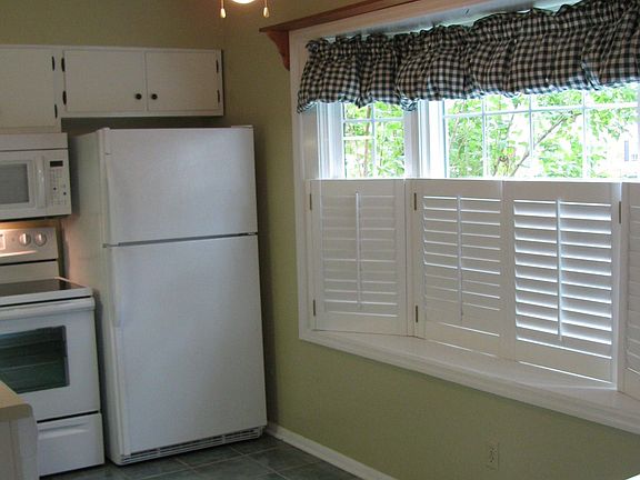 Bay window w/ custom plantation shutters