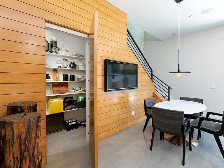 Storage area for small kitchen appliances.