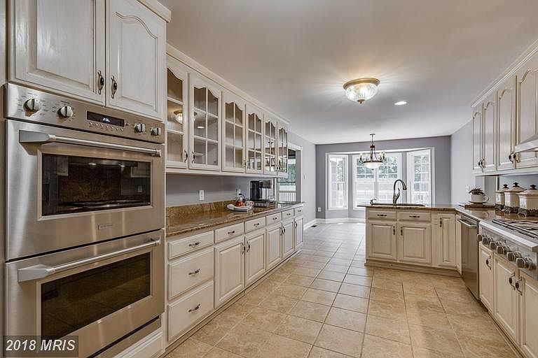Beautiful Galley Kitchen with Granite