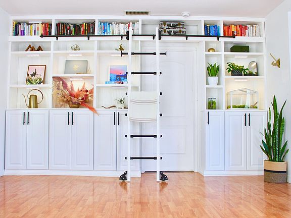 Built-in bookcase to display your photos with plenty of storage underneath