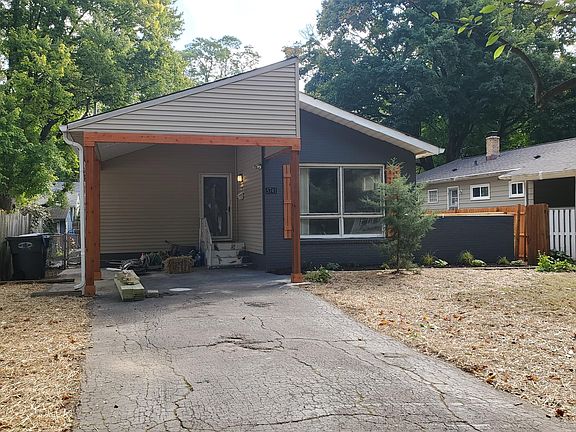 Single car driveway with carport and additional off-street parking