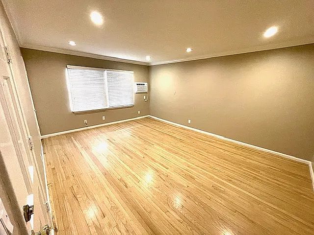Living Room W/Canned Lighting & Refinished Hardwood Floors