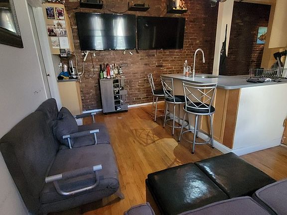 2nd image of 329 E 13th St APT 2A
