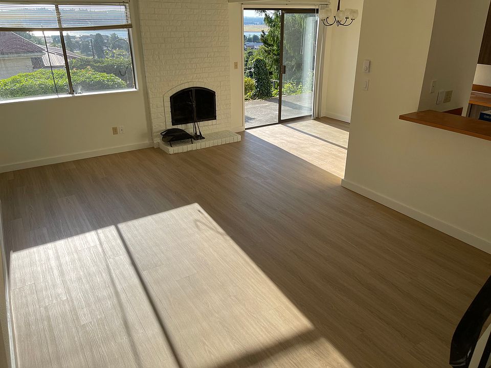 Views from Living Room, fireplace and new flooring