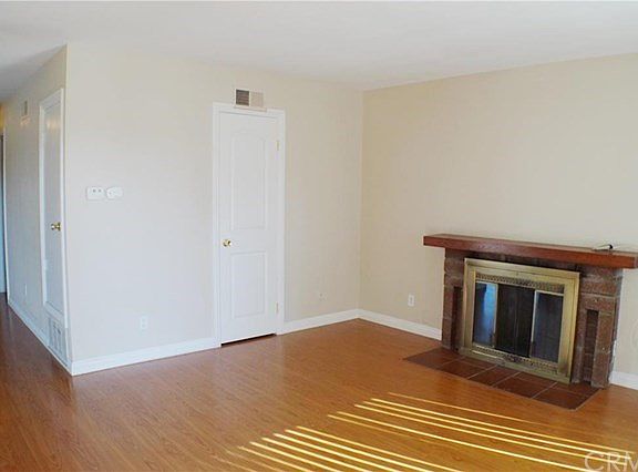 Laminated floor throughout