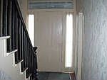 Front door bottom of stairs