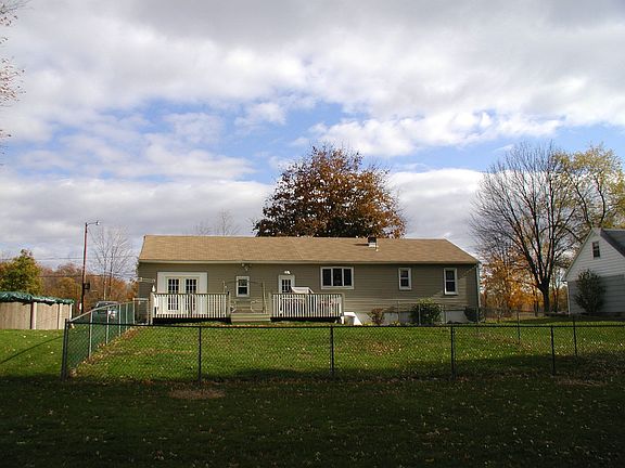 large deck and partial fenced in yard for the kids.