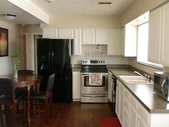Kitchen with window to back yard.