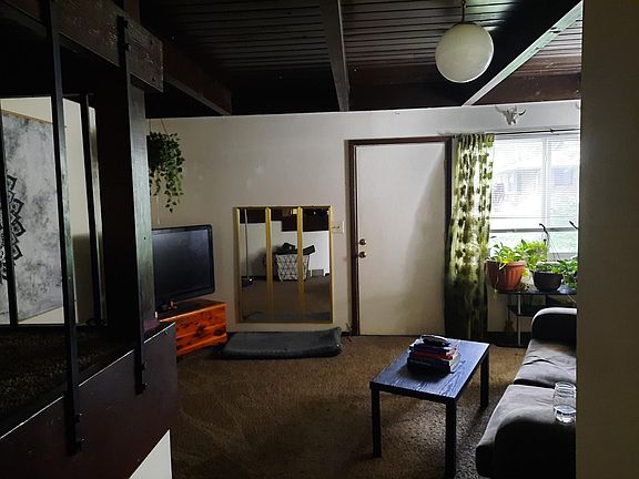Living room with door to backyard