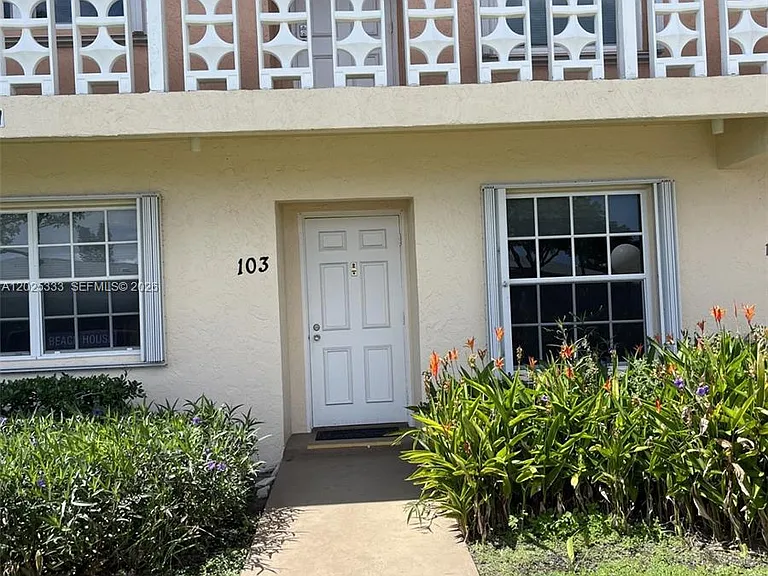 1640 NW 19th Ter #103 — Photo 1