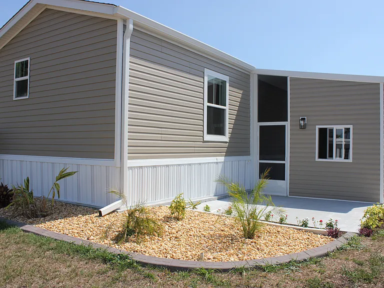 rear of building with outdoor patio